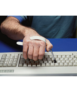 Maddak Keyboard Aid and Button Pusher - Shown in use